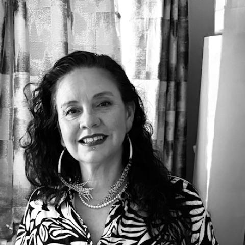 Black and White image of a women with longhair 