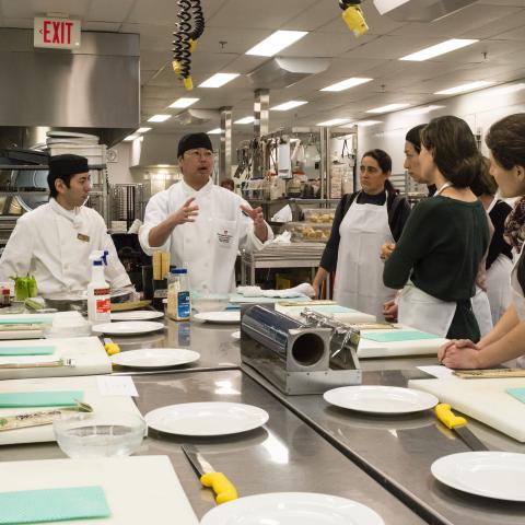 Employees Attending a Sushi Learn at Lunch 