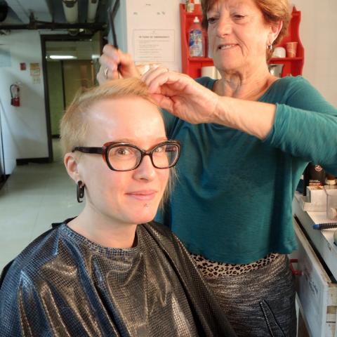 Carol Chambers puts Andrea Stienwand's hair into pincurls