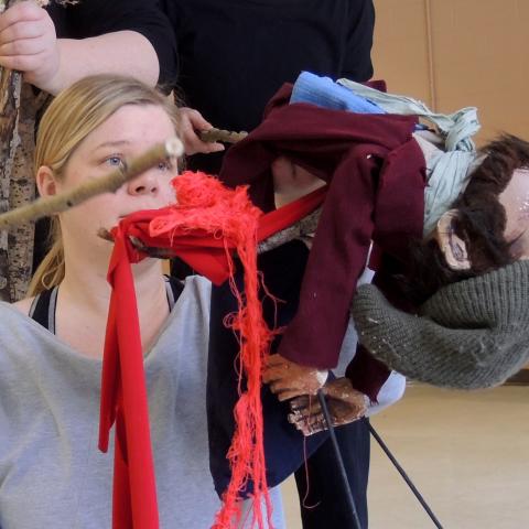 Participants rehearse the death of their puppet character