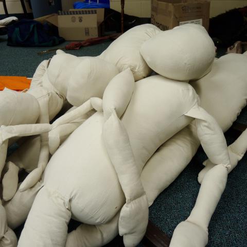 A pile of stuffed dummies