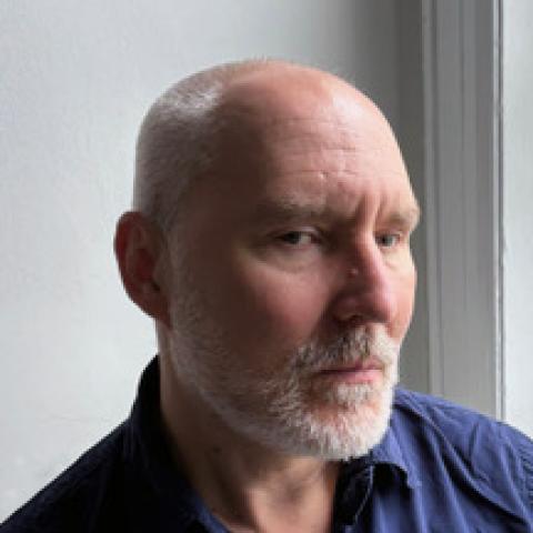 Headshot of Reid Anderson