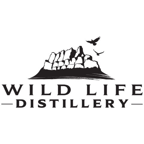 Wild Life Distillery text in black with a black outline of Castle Mountain above it