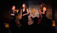 Members of Australian Chamber Orchestra performing on a a stage