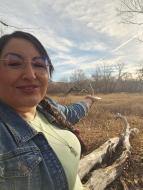 Photo of Indigenous woman out on the land