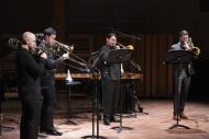 Interplay Chamber Music Concert, 2024. L to R: Lee Allen (alto trombone), Jihong Son (tenor trombone), Charlie Cao (tenor trombone), and  DJ Combs (bass trombone). Photo by Abigaile Edwards.