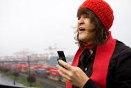 Image of person wearing red hat and scarf