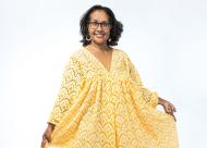 Photo of woman in handmade yellow dress