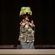 Image of Sketch in his “Tyrannosaurus Sketch” mask.