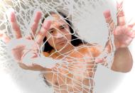 Male dancer behind a white net
