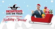 Steve Patterson sitting in a sleigh pointing to the title The Debaters Live on Tour 20th Anniversary Holiday Special